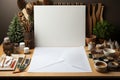 A table topped with lots of crafting supplies and big white paper sheet Royalty Free Stock Photo