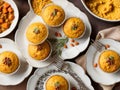 A Table Topped With Plates Of Muffins And A Bowl Of Carrots. Generative AI