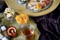 A table with Turkish tea with lale, oriental sweets Royalty Free Stock Photo
