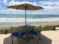 Table with two chairs near sea Royalty Free Stock Photo