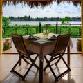 Beautiful view from table in Vietnamese restaurant to tributary river of Mekong River, near Ho Chi Minh City, Vietnam