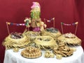 Table of typical food of junina party: paÃÂ§oca candy, lollipops, cake, dulce de leche, peanut candy. Tradicional Festa Junina