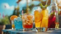 A table with a variety of colorful drinks, including a blue drink, a red drink Royalty Free Stock Photo