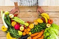 Table view of coloured mix of fresh and seasonal fruits and vegetables for vegan or vegetarian or just heathy food - diet and Royalty Free Stock Photo