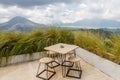 Table with a view of volcano Batur. Bali, Indonesia. Royalty Free Stock Photo