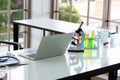 Table was adorned with a harmonious trio a laptop a microscope and a chemical tube symbolizing the blend of research analysis. Royalty Free Stock Photo