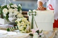 A table for wedding presents decorated with bouquets of roses Royalty Free Stock Photo
