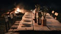 A table with wine bottles and plates on it next to a fire, AI Royalty Free Stock Photo