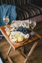 Table with wine, cheese, bread, grapes and pears Royalty Free Stock Photo