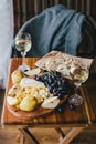 Table with wine, cheese, bread, grapes and pears Royalty Free Stock Photo