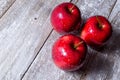 On the table are three red apples Royalty Free Stock Photo