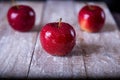 On the table are three red apples Royalty Free Stock Photo