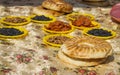 Tablecloth covered with Oriental sweets, nuts and lavash