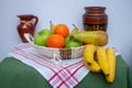 Tablecloth with pears, bananas, oranges and fresh green apples Royalty Free Stock Photo