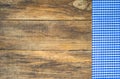 Tablecloth rustic blue on wooden table. Royalty Free Stock Photo