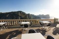 Tables of cafe at sunset on Cap de Formentor - beautiful coast of Majorca, Spain - Europe. Royalty Free Stock Photo
