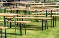 tables and chairs on a lawn to entertain guests outdoors Royalty Free Stock Photo