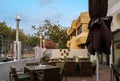 Tables and chairs at a restaurant - Cozy and elegant outdoor cafe in Abu Dhabi, UAE Royalty Free Stock Photo