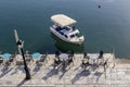 Tables and chairs of a street cafe Greece, Peloponnese Royalty Free Stock Photo