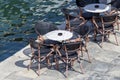 Tables and chairs of a street cafe Greece, Peloponnese Royalty Free Stock Photo