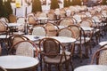 Tables and chairs of street cafe