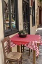 The tables and chairs of a street cafe-restaurant