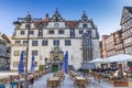 Tables and chairs at the town hall of Hannoversch Munden Royalty Free Stock Photo