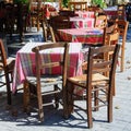 Tables and chairs in traditional Greek tavern