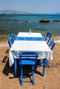 Tables with chairs in traditional Greek tavern