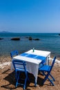 Tables with chairs in traditional Greek tavern Royalty Free Stock Photo