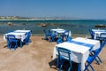 Tables with chairs in traditional Greek tavern