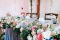 Tables decor in the restaurant at wedding ceremony, flowers, food and number table Royalty Free Stock Photo