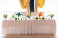 Tables decorated with flowers and fruit Royalty Free Stock Photo