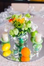 Tables decorated with flowers and fruit Royalty Free Stock Photo