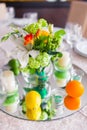 Tables decorated with flowers and fruit Royalty Free Stock Photo