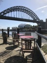 Tables on the quayside Newcastle Tyne and Wear Royalty Free Stock Photo