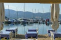 Tables of a restaurant near the sea, very typical in Greece Royalty Free Stock Photo