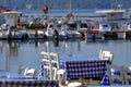 Tables of a restaurant near the sea, very typical in Greece Royalty Free Stock Photo