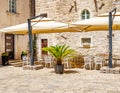 Tables in the restaurant in the open air. Royalty Free Stock Photo