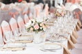 Tables set for an event party or wedding reception. luxury elegant table setting dinner in a restaurant. glasses and Royalty Free Stock Photo