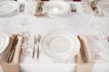 Tables set for an event party or wedding reception. luxury elegant table setting dinner in a restaurant. glasses and Royalty Free Stock Photo