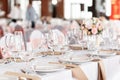 Tables set for an event party or wedding reception. luxury elegant table setting dinner in a restaurant. glasses and Royalty Free Stock Photo