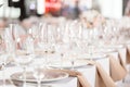 Tables set for an event party or wedding reception. luxury elegant table setting dinner in a restaurant. glasses and Royalty Free Stock Photo