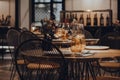 Tables set inside a restaurant, shallow focus Royalty Free Stock Photo