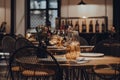 Tables set inside a restaurant, shallow focus Royalty Free Stock Photo