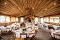 Tables set up in rustic banquet hall for a wedding Royalty Free Stock Photo