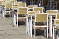 Tables of a terrace arranged in a row with safety distance Royalty Free Stock Photo