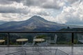 Tables with a view of volcano Batur. Bali, Indonesia. Royalty Free Stock Photo