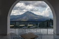 Tables with a view of volcano Batur. Bali, Indonesia. Royalty Free Stock Photo