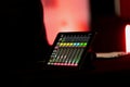 Tablet based mixing console showing multiple audio channels and meters, capturing the technical setup Royalty Free Stock Photo